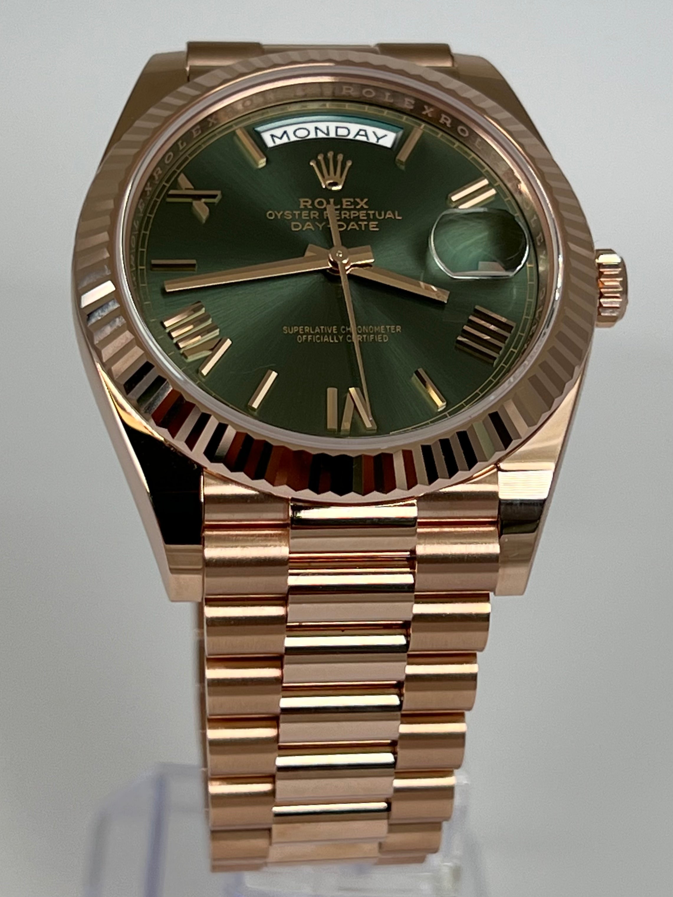 Rolex day date rose hotsell gold green dial price