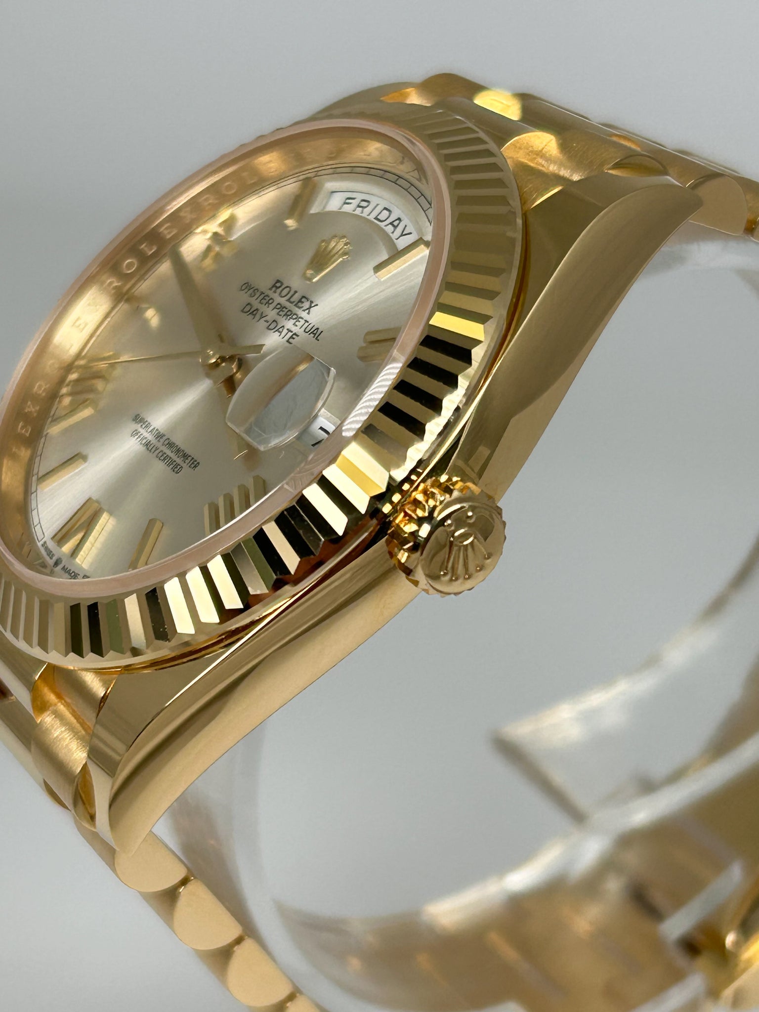 Rolex Day-Date 40 Silver Roman Yellow Gold 228238