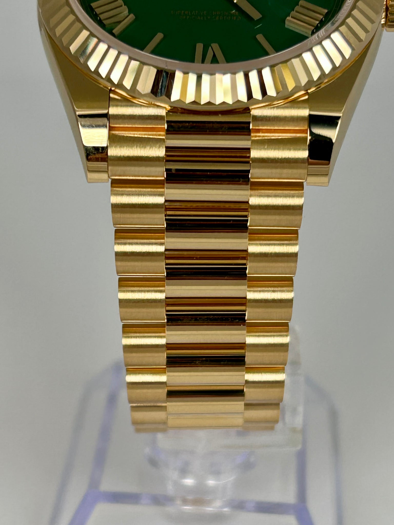 Rolex Day-Date 40 Green Roman Yellow Gold 228238